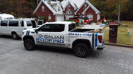 Our truck in front of a house we are working on.